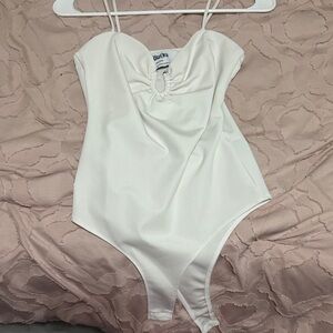 Minimal White One-Piece Bodysuit with Snap Bottom